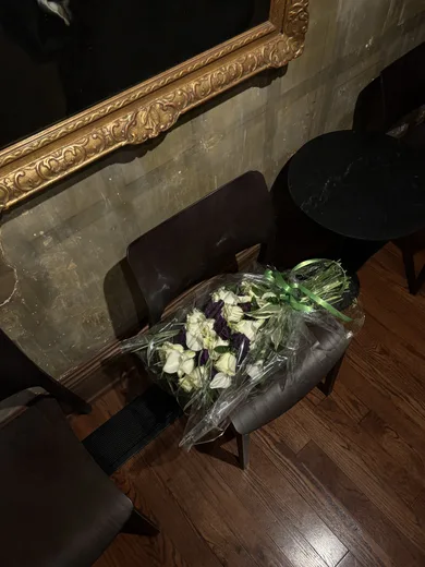 White flowers on a dark wooden table